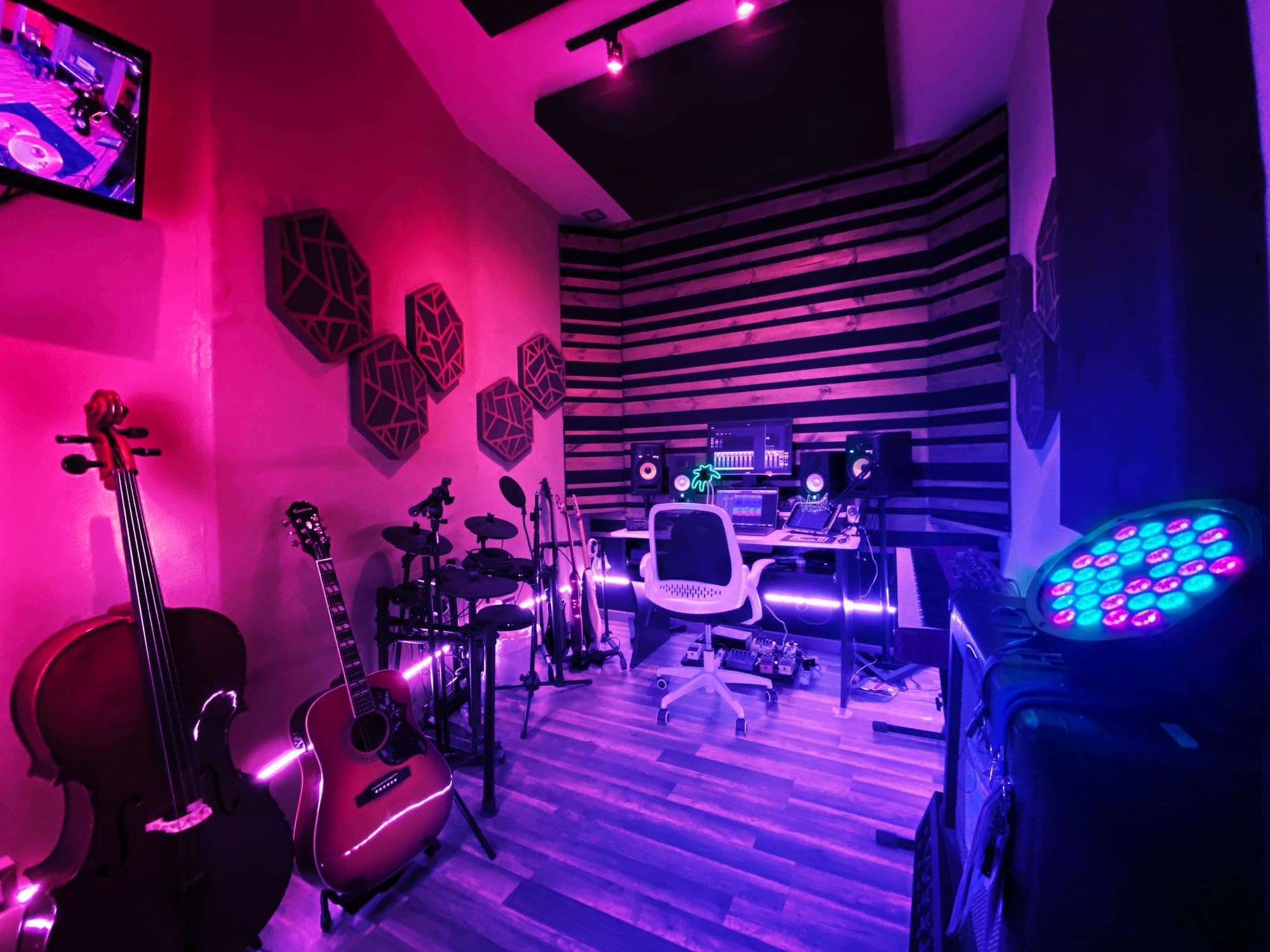 The PM Productions room in Rome - cello, guitar, kit and the control desk